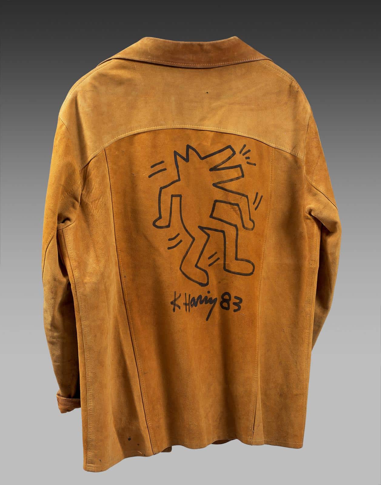 “Suede jacket with a drawing on the back” by Keith Haring